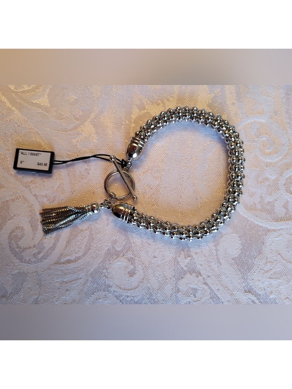 Fifth Avenue Collection "All I Want" Silver Toned Bracelet with Tassel